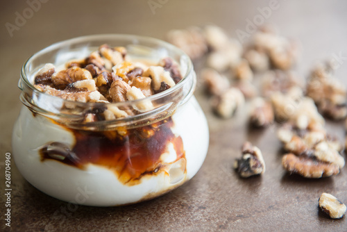 Yogur dessert with nutz photo