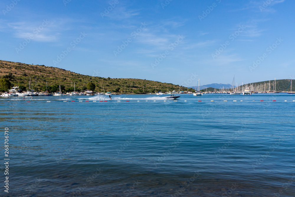 Panorama of the beach with recreation yachts on Turkish resort, Bodrum, Turkey