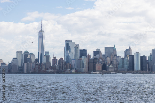 View of Manhattan buildings and river from Brooklyn neighborhood, New York.