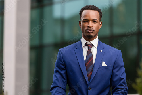 Outdoor standing portrait of a black African American business man