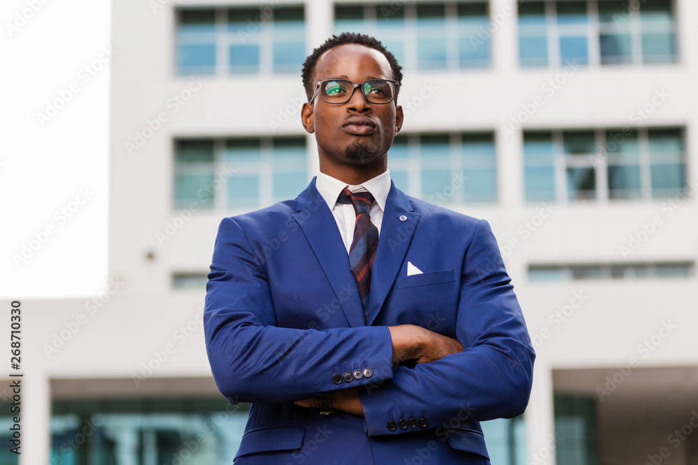 Outdoor standing portrait of a black African American business man