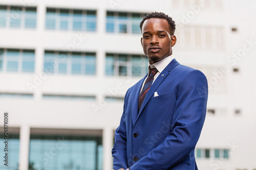 Outdoor standing portrait of a black African American business man