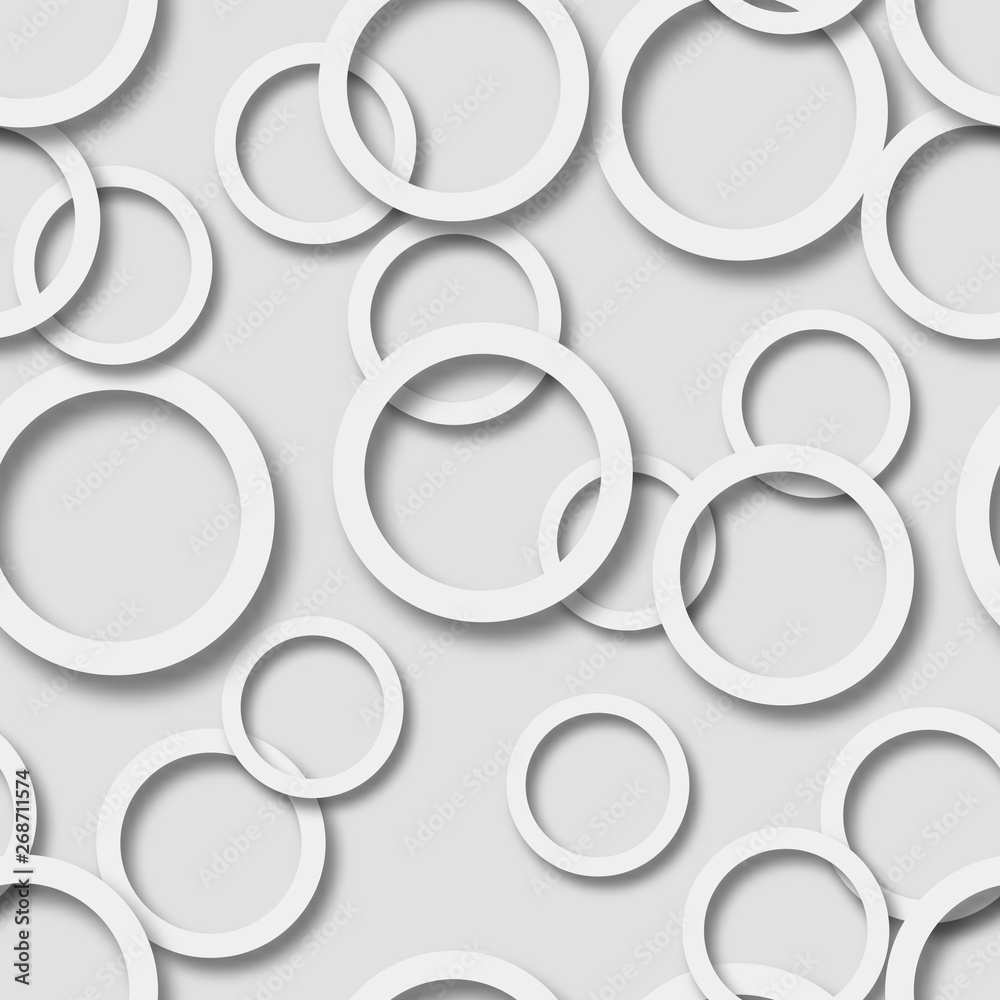 Abstract seamless pattern of randomly arranged white rings with soft shadows on gray background Abstract seamless pattern of randomly arranged white rings with soft shadows on gray background