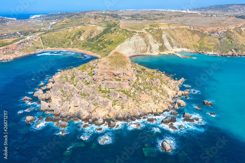 Gnejna and Ghajn Tuffieha bay on Malta island. Aerial view from the height of the coastlinescenic sliffs near the mediterranean turquoise water sea.