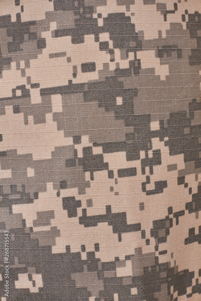 Close up old camouflage. Fabric texture background.