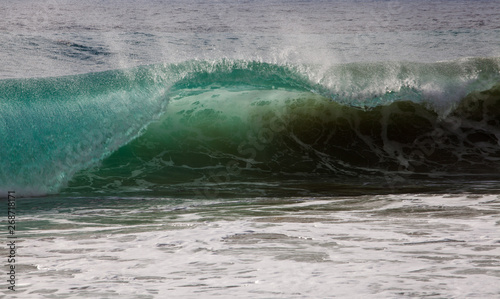wave breaking on beach