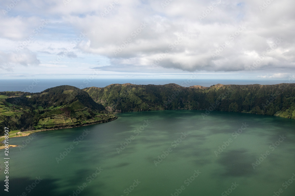 aerial landscape of the impressive volcanic crater with Lagoa Azul at Sete Cidades