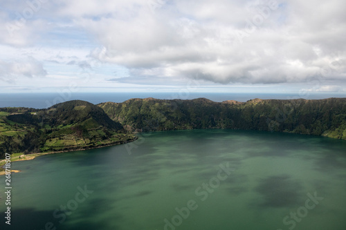aerial landscape of the impressive volcanic crater with Lagoa Azul at Sete Cidades