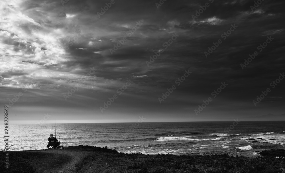fisherman on central coast of california black and white