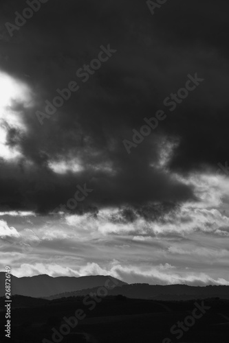 dramatic sky with clouds and sun