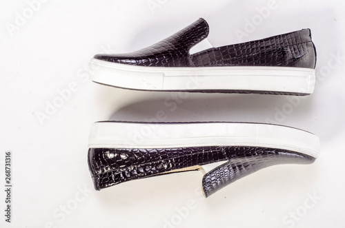 Women's flat photo black shoes isolated on white background photo
