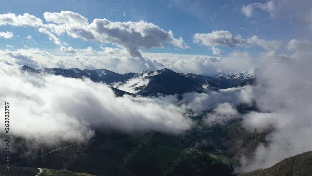 Drone shot of clouds in mountains beautiful weather with blue sky, light in summer nature. 4K UHD Drone shot of clouds in mountains beautiful weather with blue sky, light in summer nature. 4K UHD