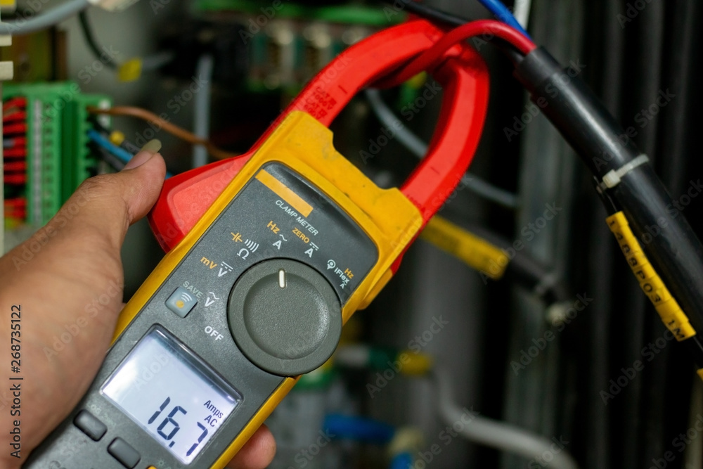clamp meter check current in panel Stock Photo Adobe Stock