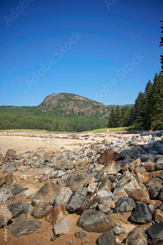 Sand Beach  Acadia National Park  Bar Harbor Maine A gorgeous beach surrounded by interesting rocks  cliffs and forest. 