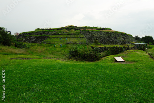 Mexico City, Mexico - 2019: Front view of a circular pyramid at Cuicuilco Archaeological Site, located in today's Tlalpan district.