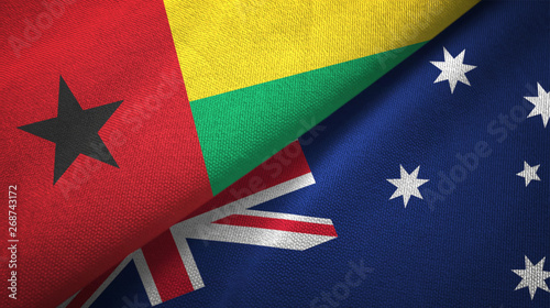 Guinea-Bissau and Australia two flags textile cloth, fabric texture 