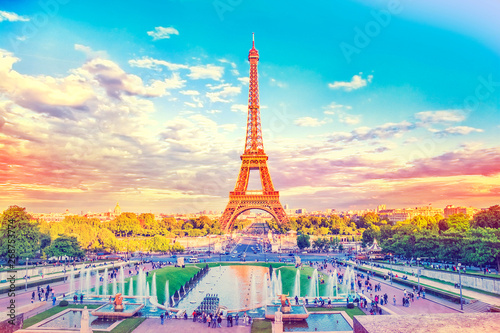 Fototapeta Naklejka Na Ścianę i Meble -  Eiffel Tower and fountain at Jardins du Trocadero, Paris, France. Travel background with retro vintage instagram filter