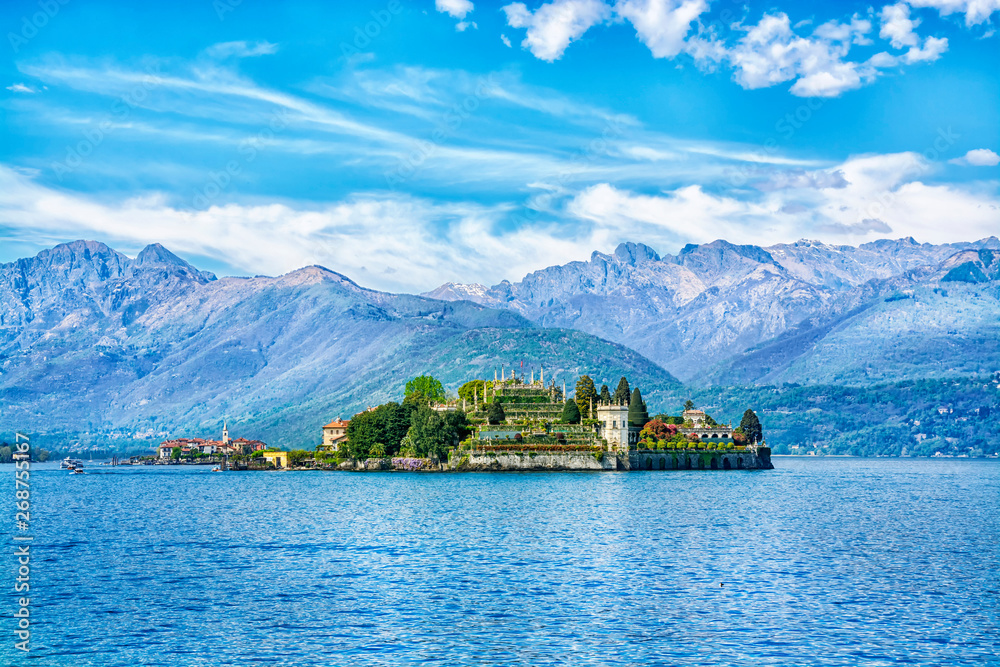 Isola Bella Island on the beautiful Lake Lago Maggiore in the background of the Alps mountains, Stresa, Italy