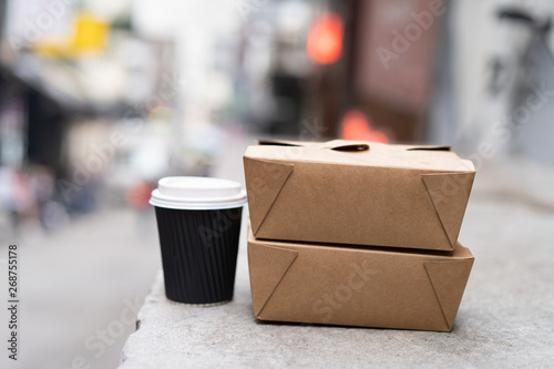 Take Out Box from Cardboard and Cup of Coffee. Blank Take away Container and Paper Coffee Cup Mock-up. Close up Empty Presentation Template. photo