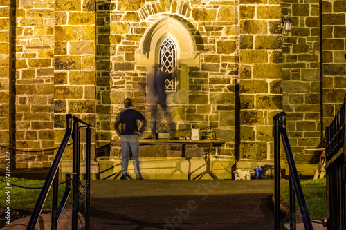 Men are reapiring historic church window in Donegal town - Ireland photo