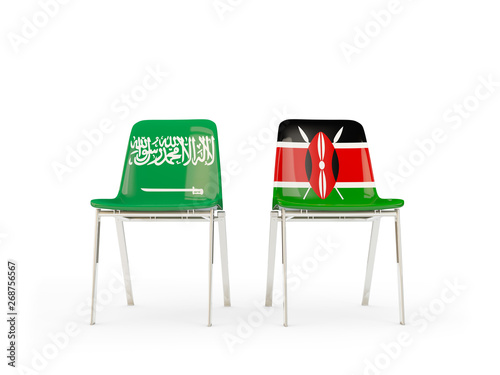 Two chairs with flags of Saudi Arabia and kenya isolated on white