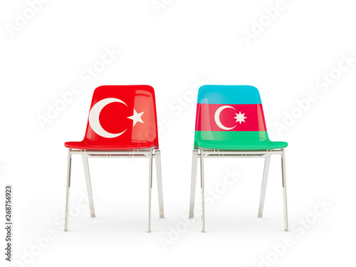 Two chairs with flags of Turkey and azerbaijan isolated on white photo