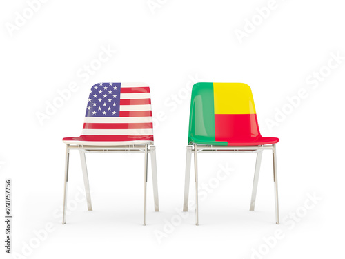 Two chairs with flags of United States and benin isolated on white