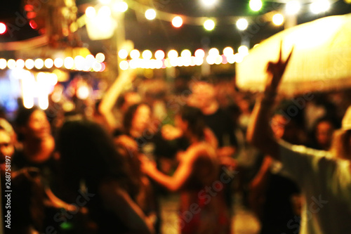 Tableau sur toile Blurred background of many people had fun at a beach party