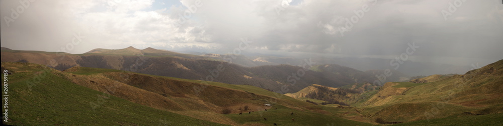 Mountain panorama in rain