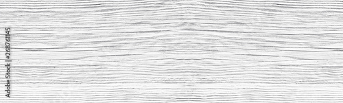 Old cracked white painted solid wooden surface wide texture. Whitewashed wood panoramic rustic vintage background