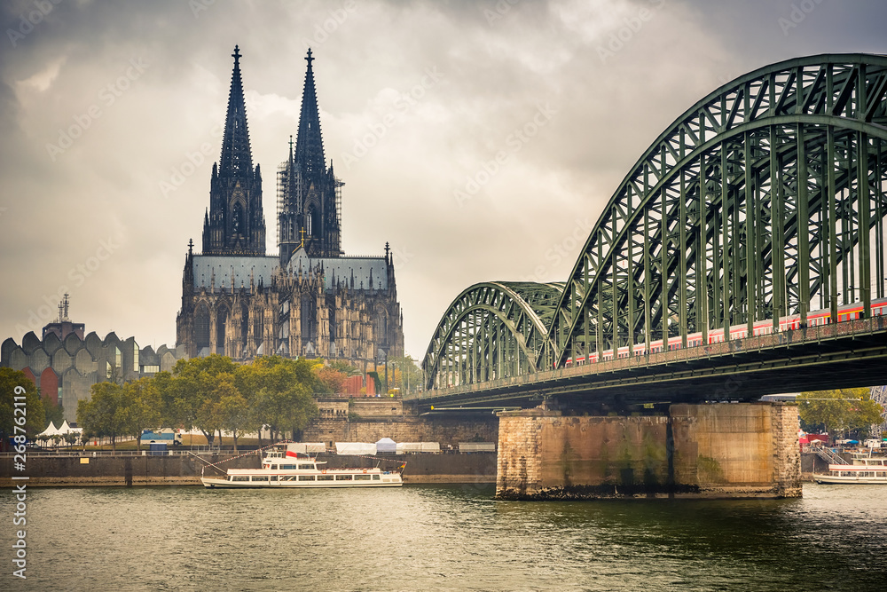 Fototapeta premium View on Cologne Cathedral and Hohenzollern Bridge, Germany