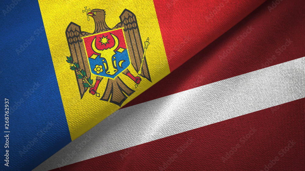 Fototapeta premium Moldova and Latvia two flags textile cloth, fabric texture
