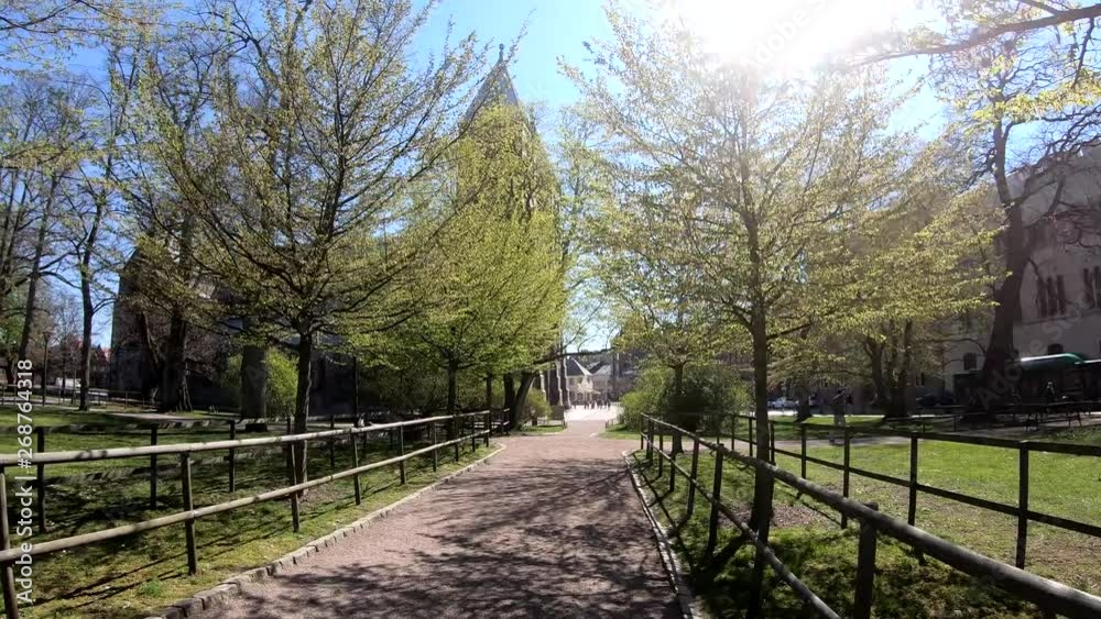walking toward Lund cathedral during sunny day
Spring in Sweden walking toward Lund cathedral during sunny day
Spring in Sweden