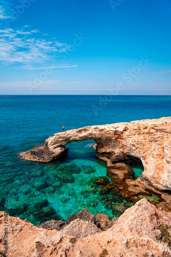Obraz na płótnie Beautiful turquoise clean water and blue sky in famous touristic Ayia Napa, Paralimni, Cyprus on a sunny day with amazing rock formations and cliffs. w salonie