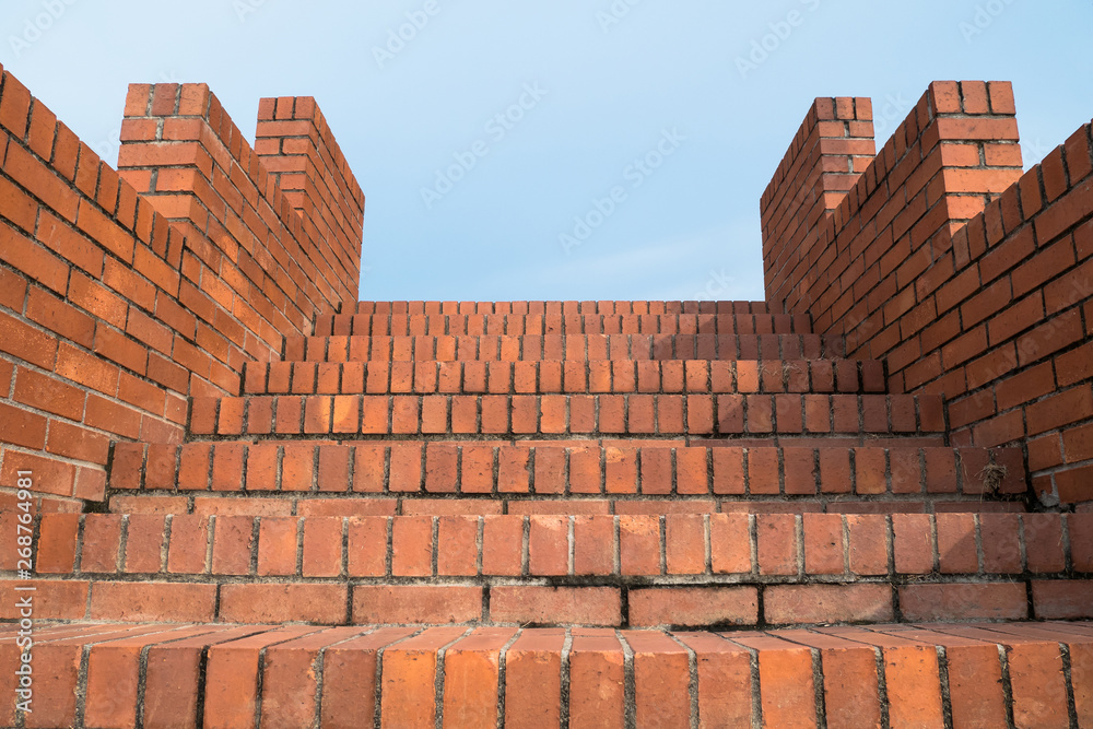 Looking up to the brick stairs.