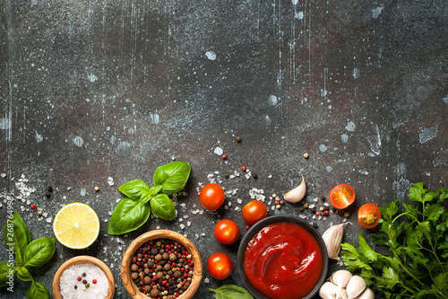 Cooking table with spices and herbs