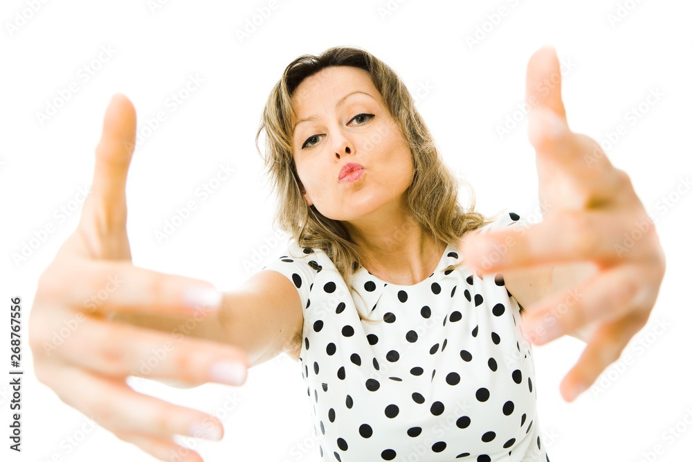Attractive women in white dress with black dots going to hug and kiss you. Attractive women in white dress with black dots going to hug and kiss you.