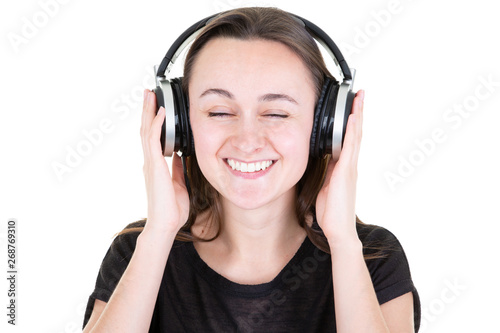 happy young woman with headphones eyes closed
