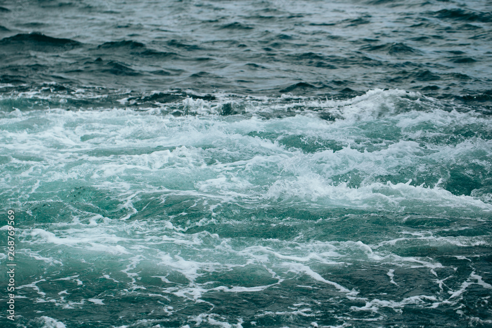 abstract background - water flows in the river or sea abstract background - water flows in the river or sea