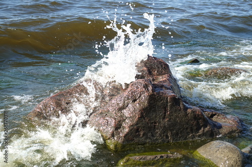 waves crashing on rocks