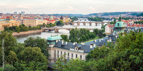Beautiful Prague and its bridges / Aerial view of famous bridges in Old Town of Prague in Czech Republic over Vltava river before the sunset.
