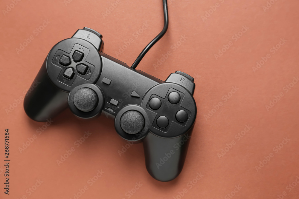 Modern game pad on color background Modern game pad on color background