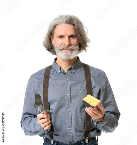 Male owner of cheese store ...