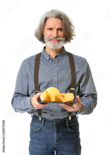 Male owner of cheese store ...