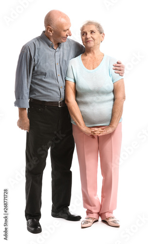 Portrait of senior couple on white background