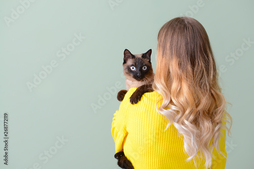 Young woman with cute Thai ...