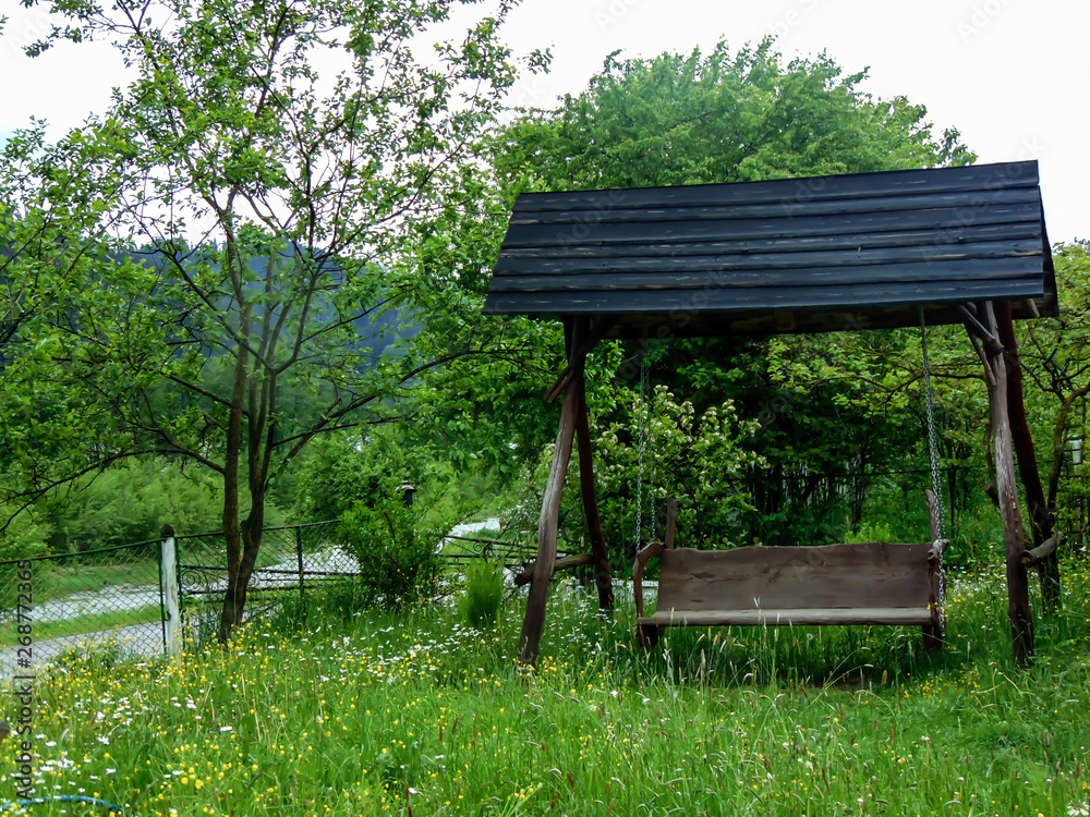 Naklejka premium wooden swing