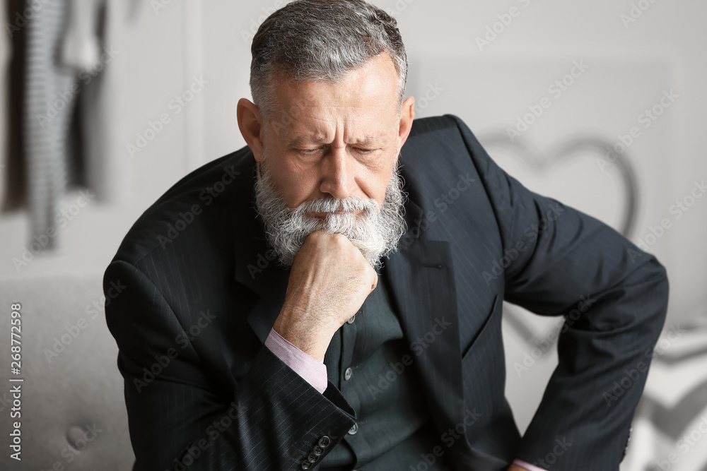 Portrait of sad senior man at home Portrait of sad senior man at home