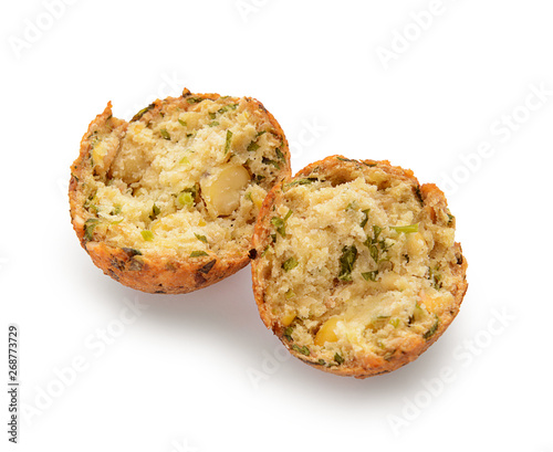 Pieces of tasty falafel ball on white background