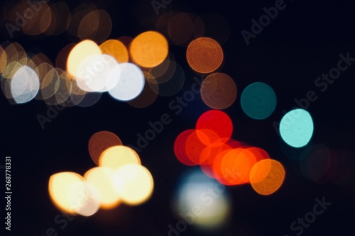 colorful lights in the street in the city at night, bokeh lights